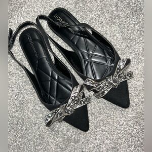 BCBGeneration Black Flats with Silver Bow